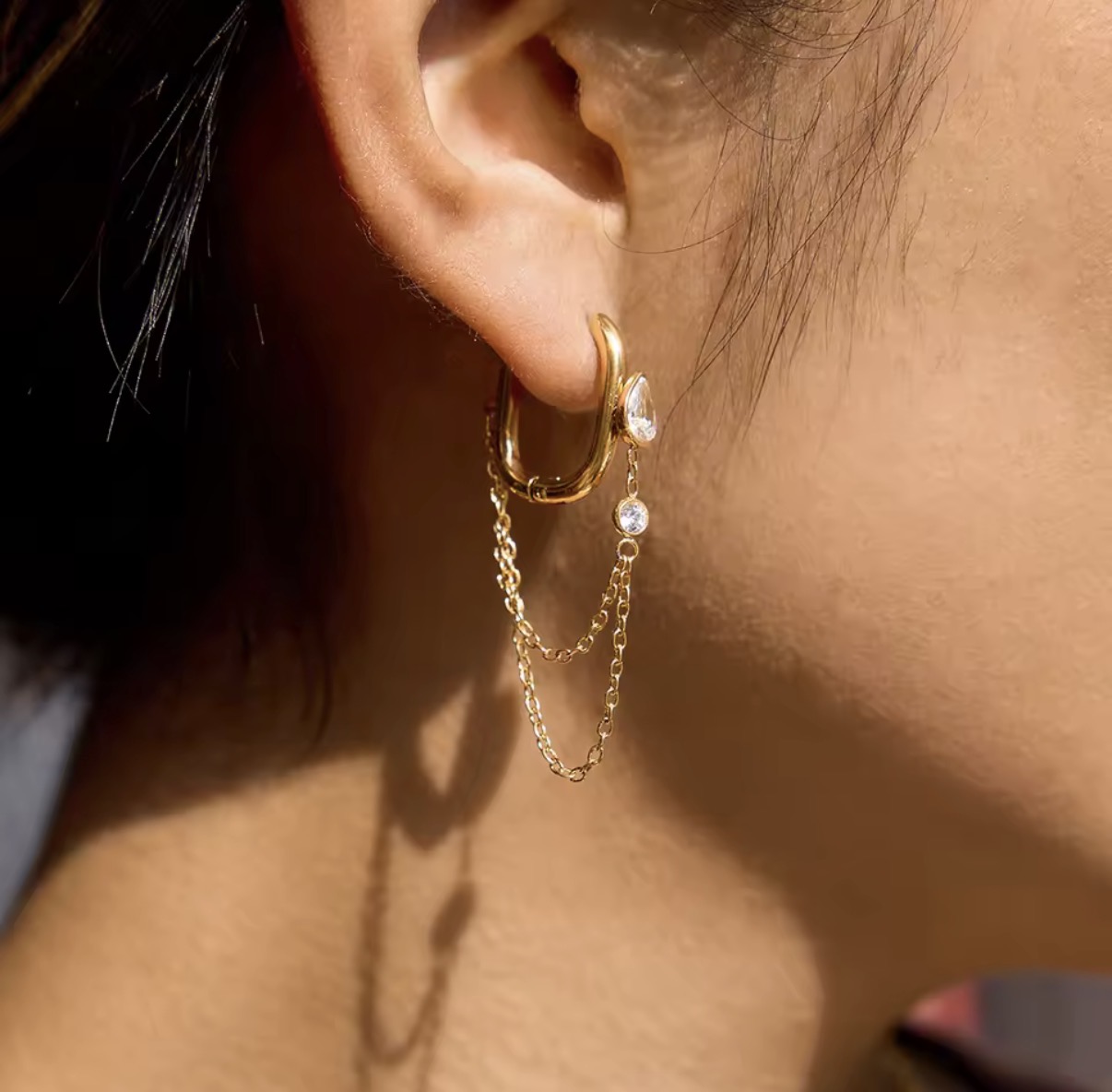 Oval Huggie Gold Hoop Earrings with Crystal Chain Dangles