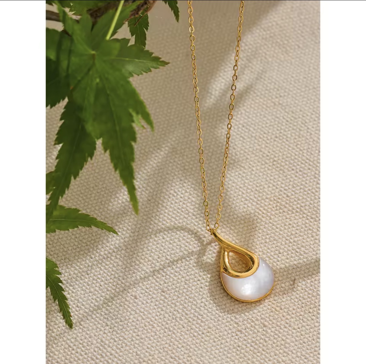 Mother of Pearl Twisted Teardrop Gold Pendant Necklace
