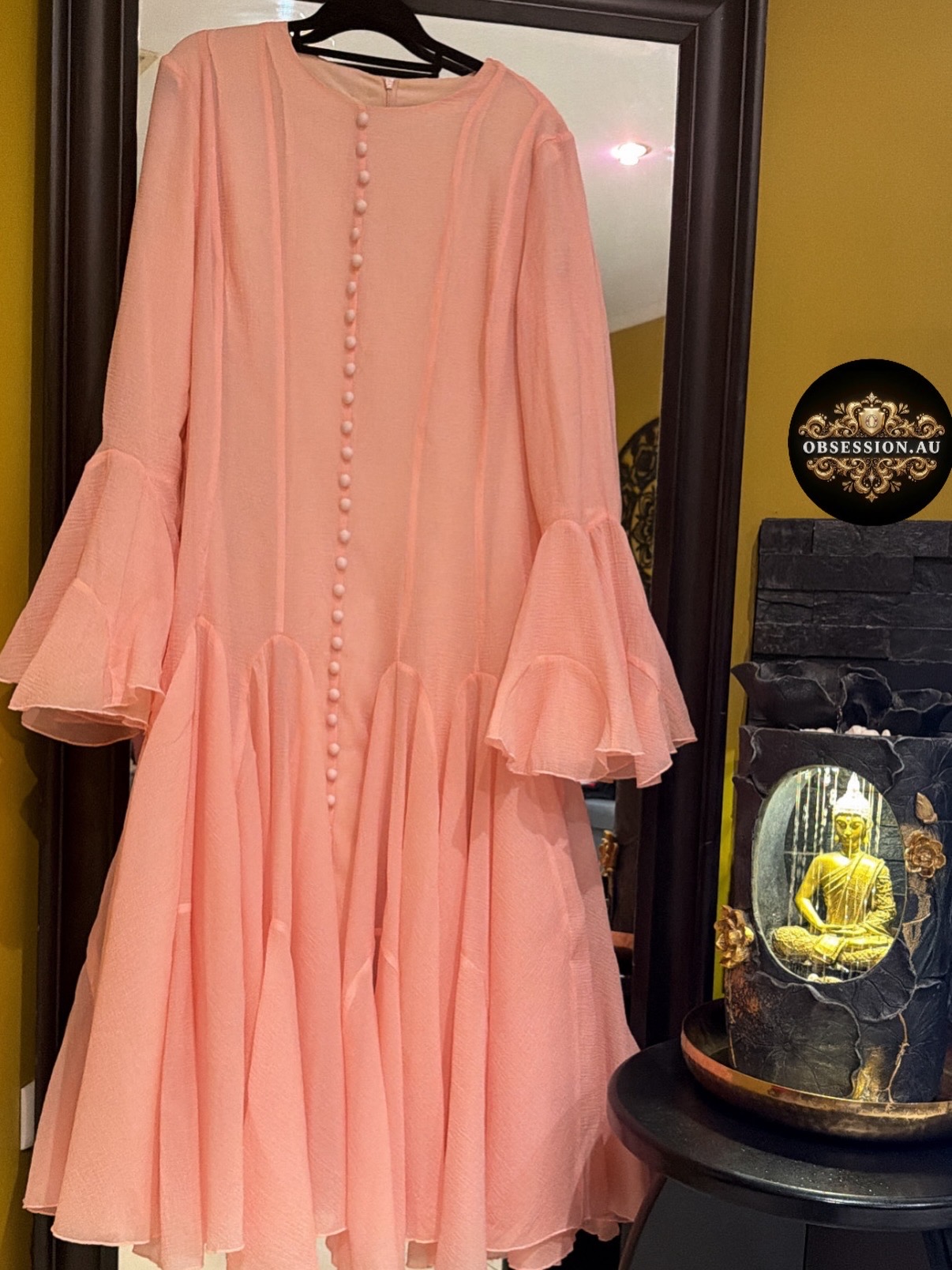 Elegant midi dress beautifully blends modern sophistication with vintage-inspired romance. 