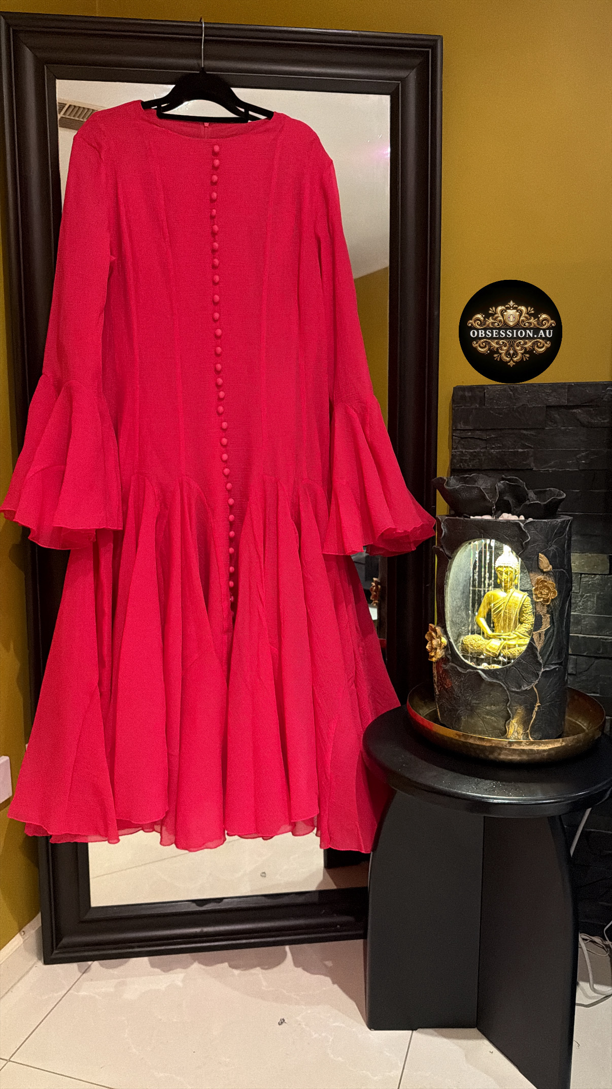 Elegant midi dress beautifully blends modern sophistication with vintage-inspired romance. 